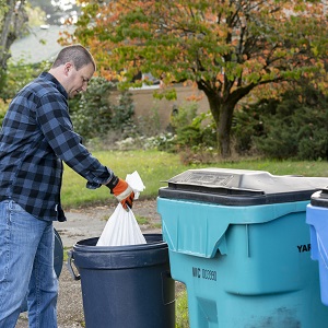 Disposing of sediment in trash.