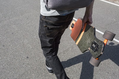 man holding skateboard 400px.jpg